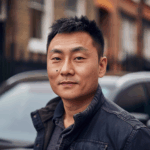 Michael Chen looking into the camera
